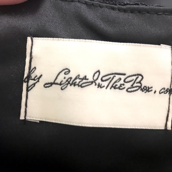 Black cocktail dress with bow in the middle - Picture 15 of 16